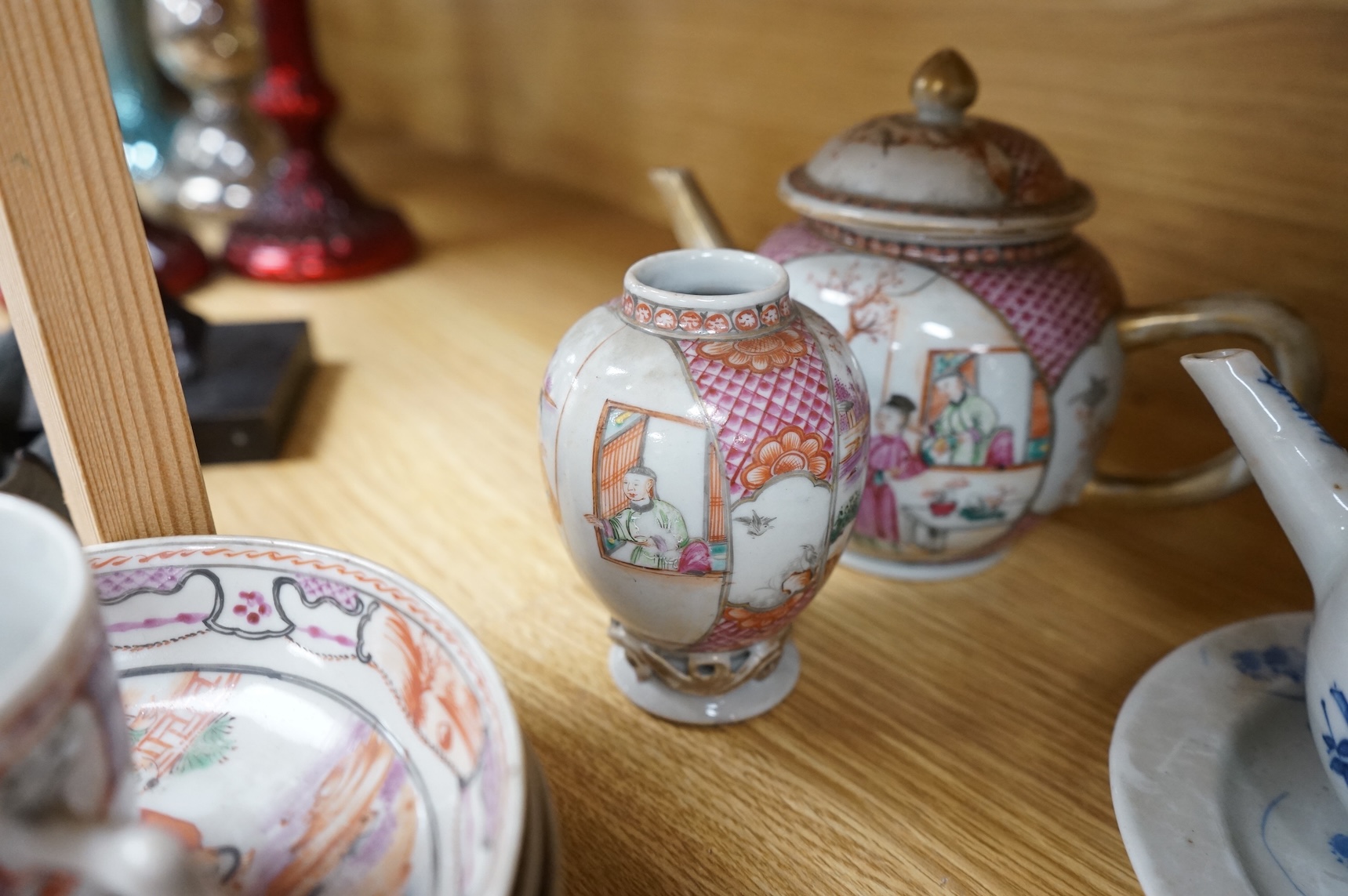 A group of 18th century Chinese export porcelain tea and coffee ware, including Mandarin pattern teapot and cover, two coffee cups and saucers, a blue and white teapot and cover various famille rose coffee cups, etc.